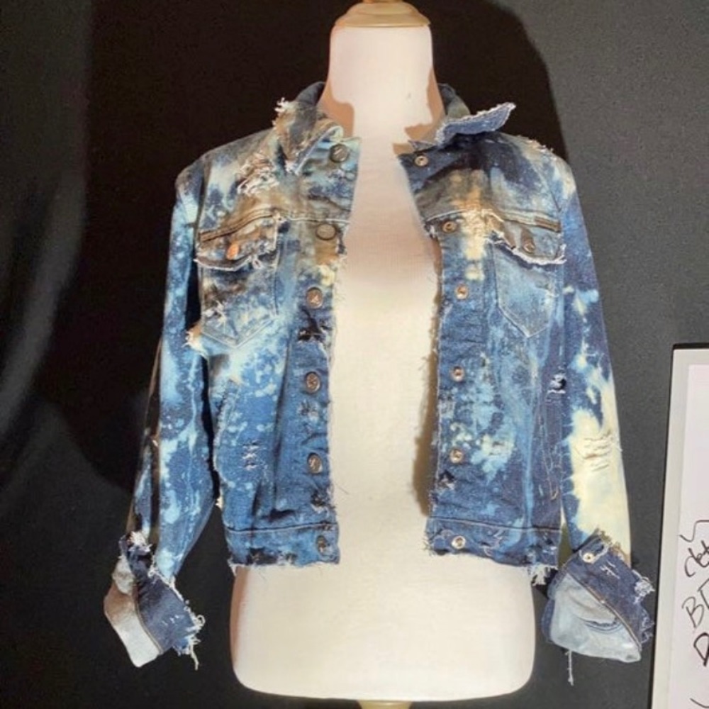 Custom distressed denim jacket